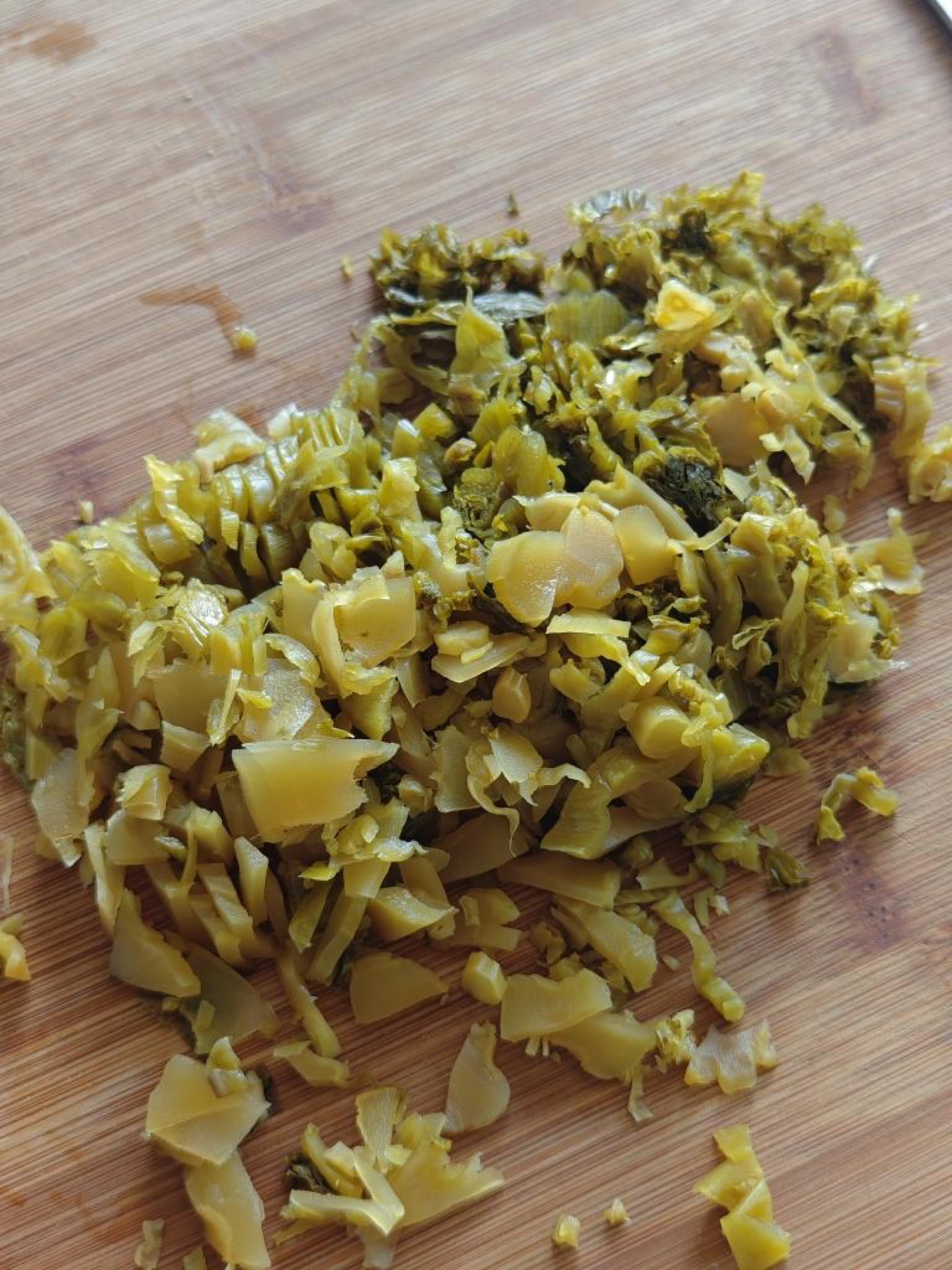 Slice the pickled cabbage into thin, even strips so they melt into the broth instead of staying chewy.