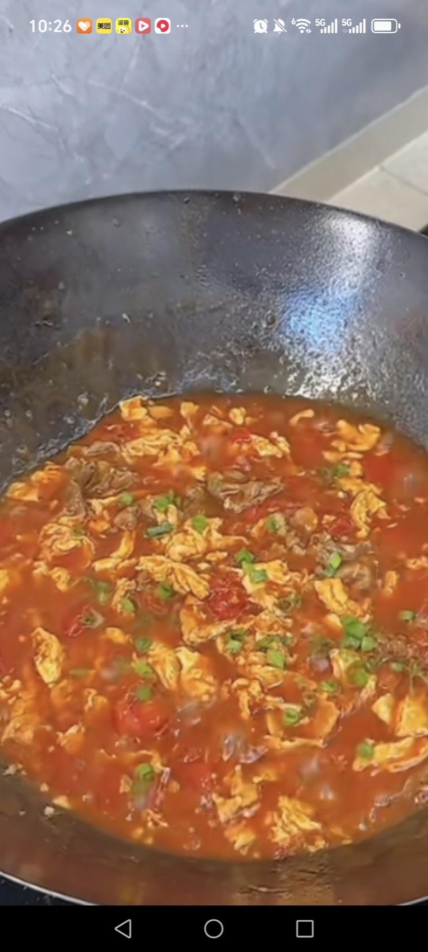 Toss everything together, stir in the cornstarch slurry and simmer until the sauce turns glossy and thick, then scatter over the scallion greens.