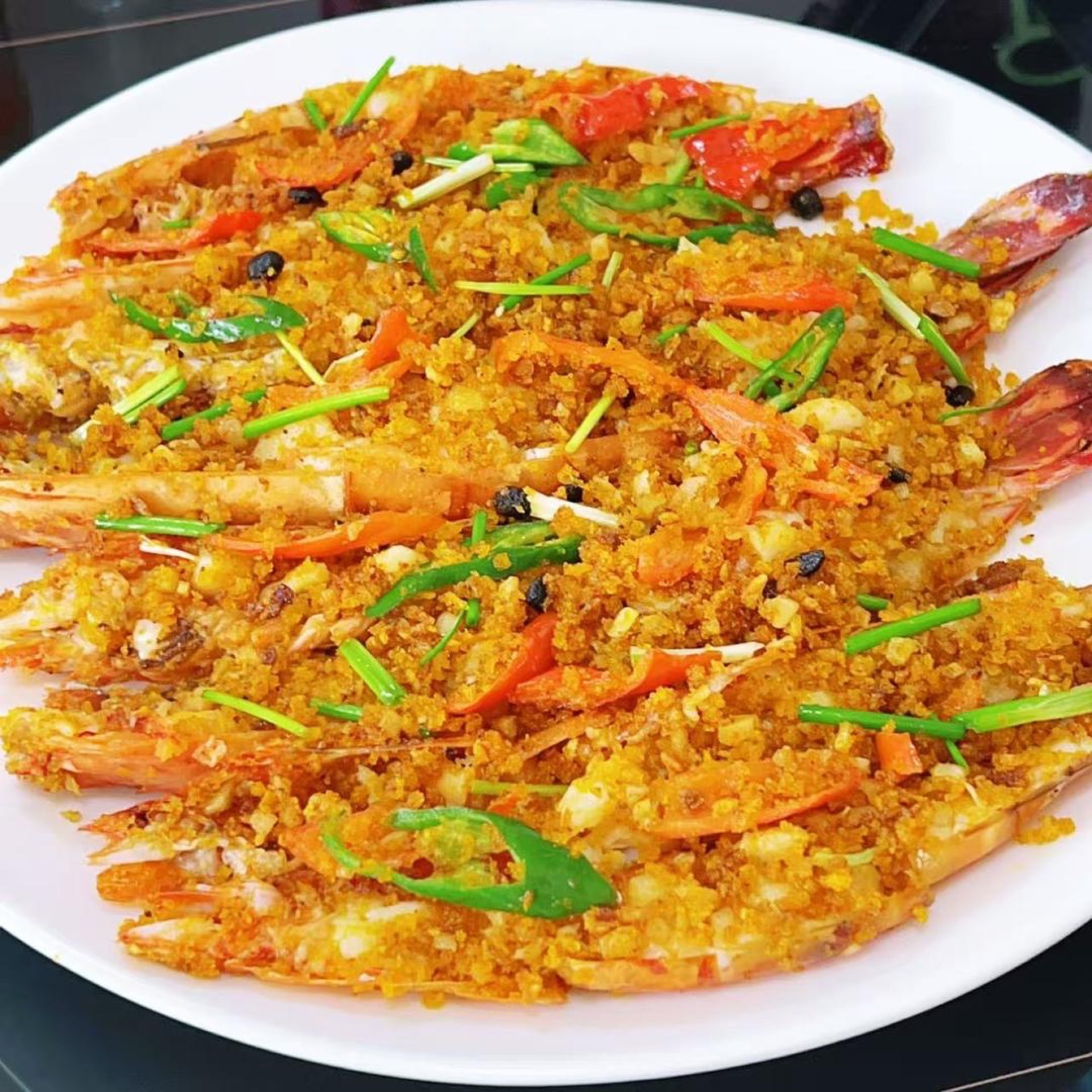 Plate the prawns for serving.