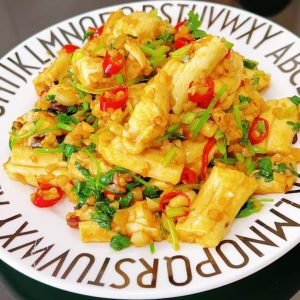 Remove from the wok and plate.